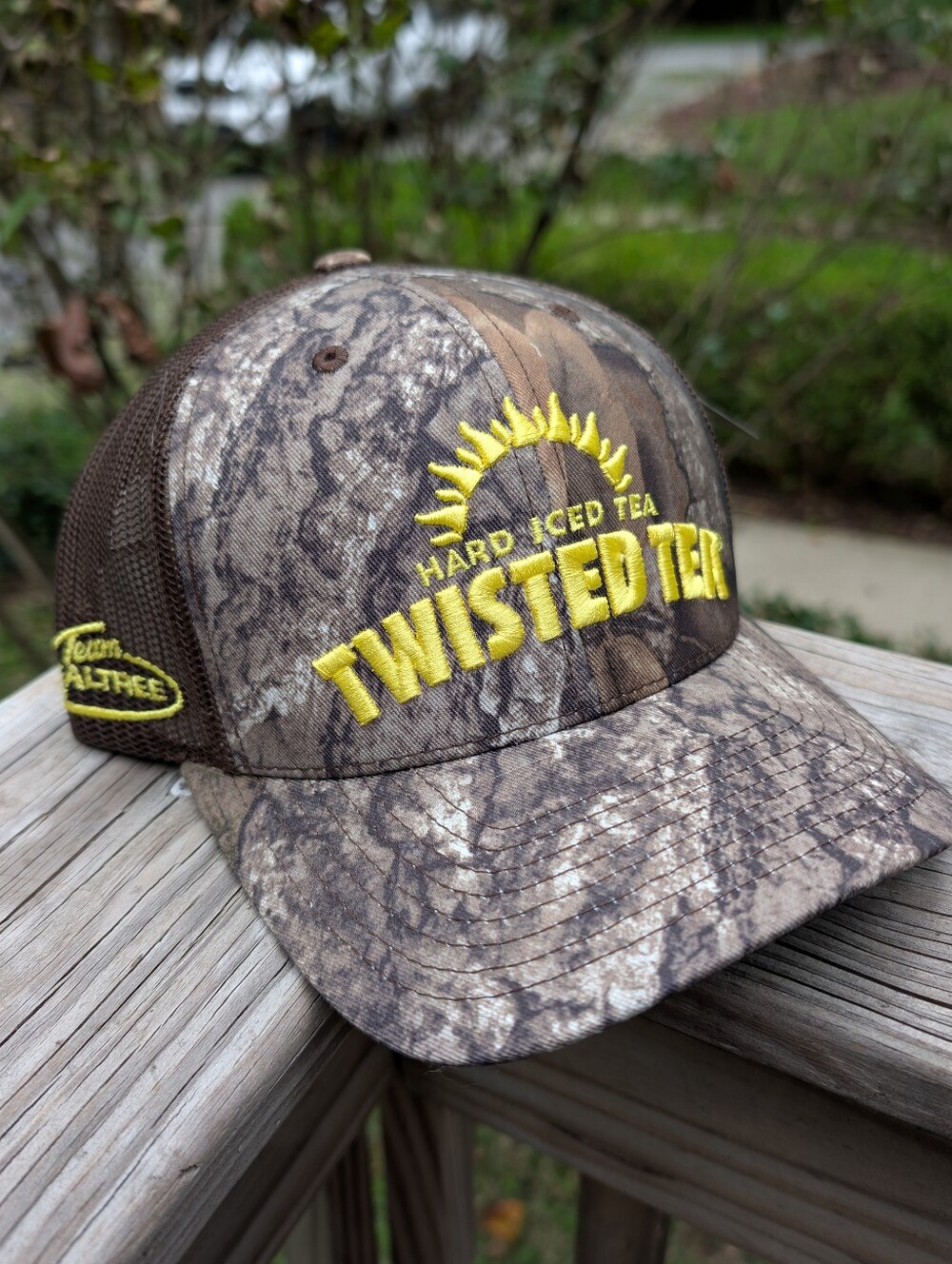Twisted Tea Camo Trucker Hat with Yellow Logo